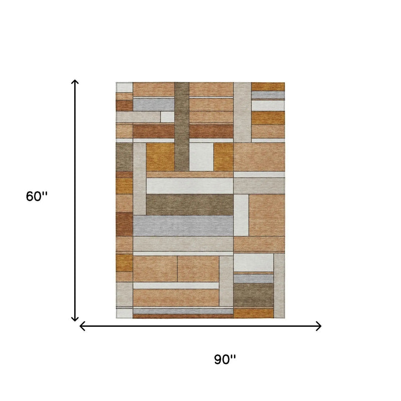 Multicolored geometric area rug, 90" x 60", featuring earth tones in blended fabric for modern decor.
