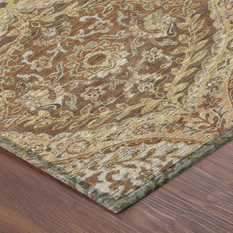 Traditional ornate area rug in gold, brown, and teal, featuring intricate floral patterns and a soft wool blend.