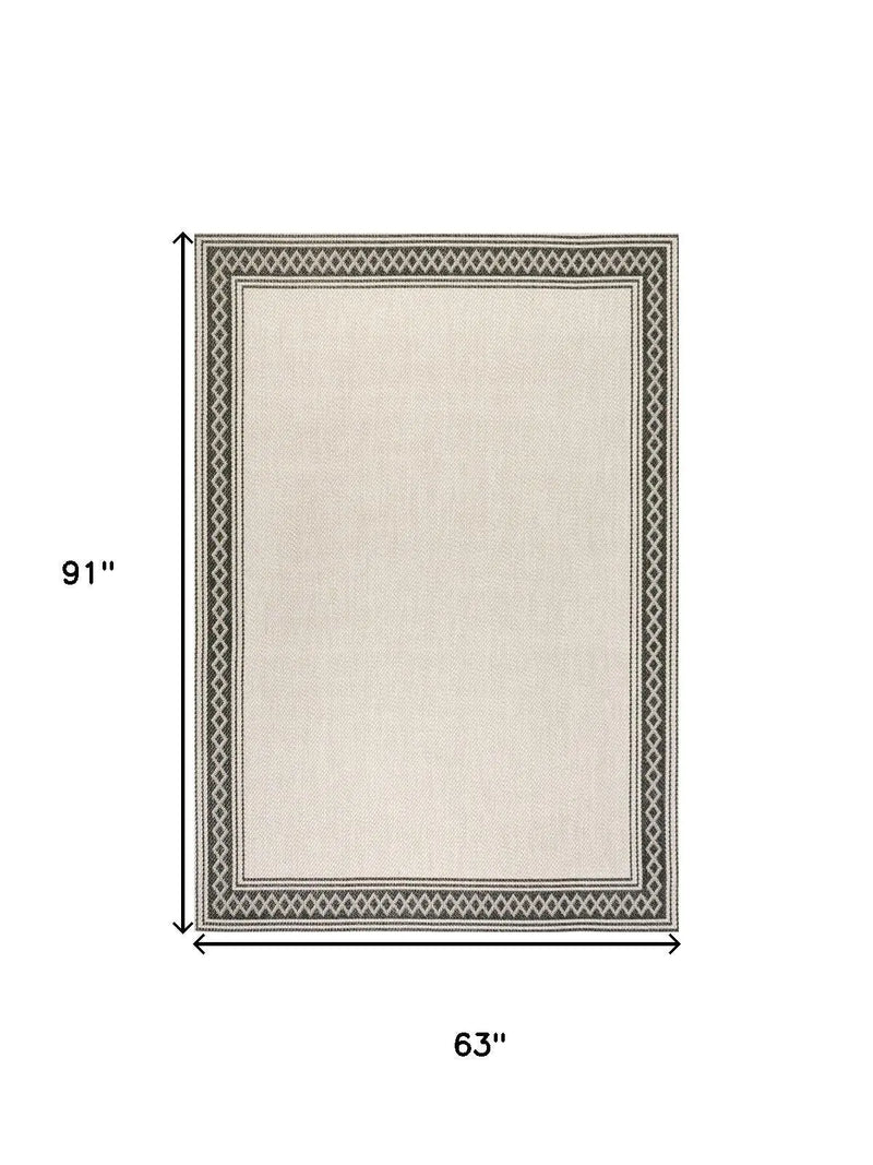 5' X 8' Cream And Black Indoor Outdoor Area Rug Homeroots Outdoor