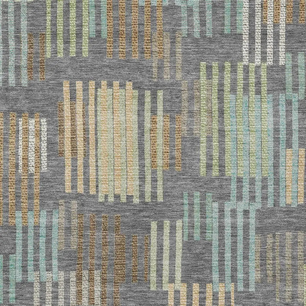 Gray fabric with colorful geometric stripes in teal, beige, and gold, perfect for modern decor or upholstery projects.