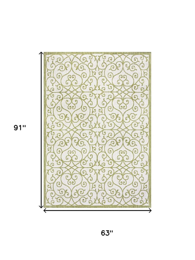 5' X 8' Green And Cream Geometric Indoor Outdoor Area Rug Homeroots Outdoor