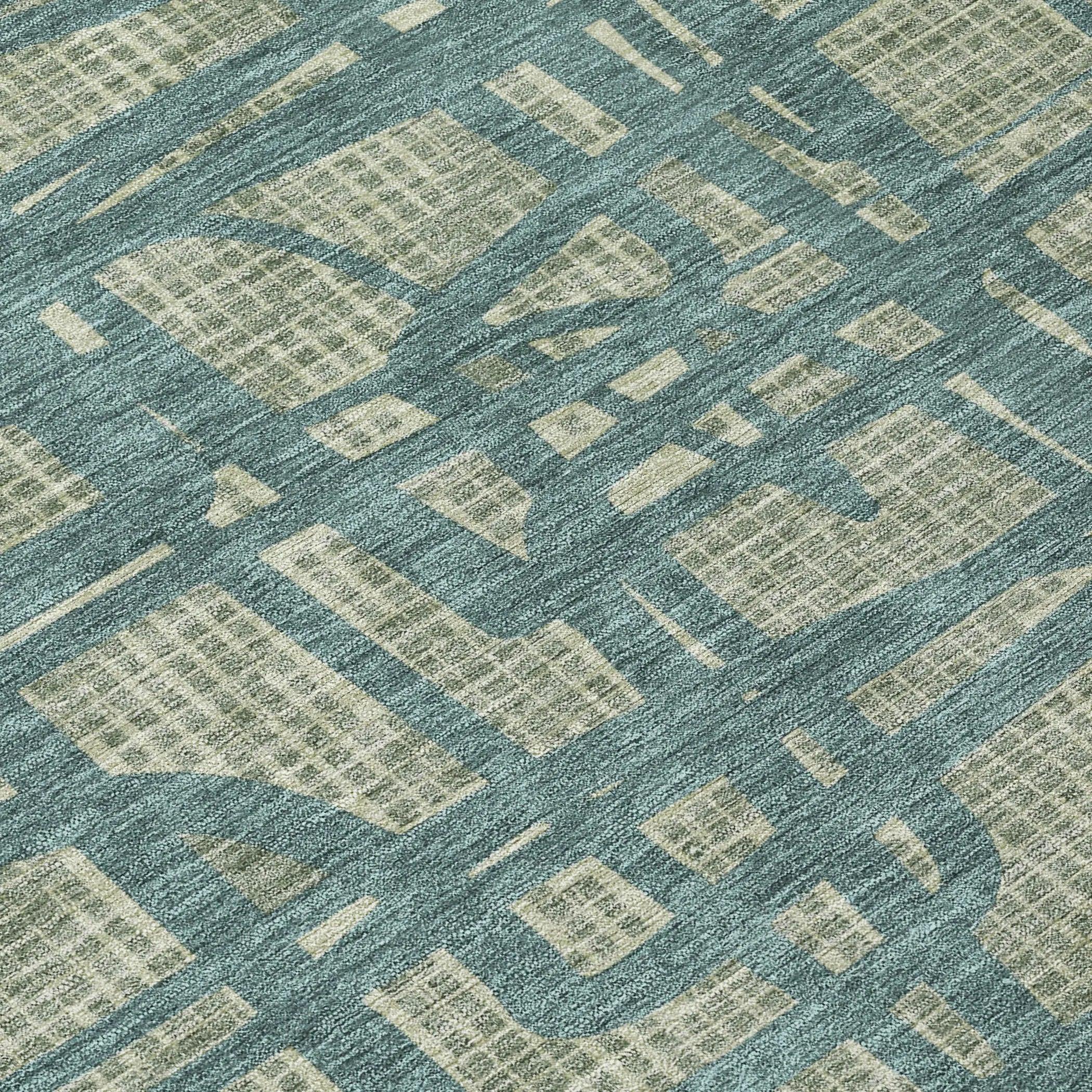 Blue and cream abstract patterned area rug, soft texture, modern design ideal for contemporary living spaces.