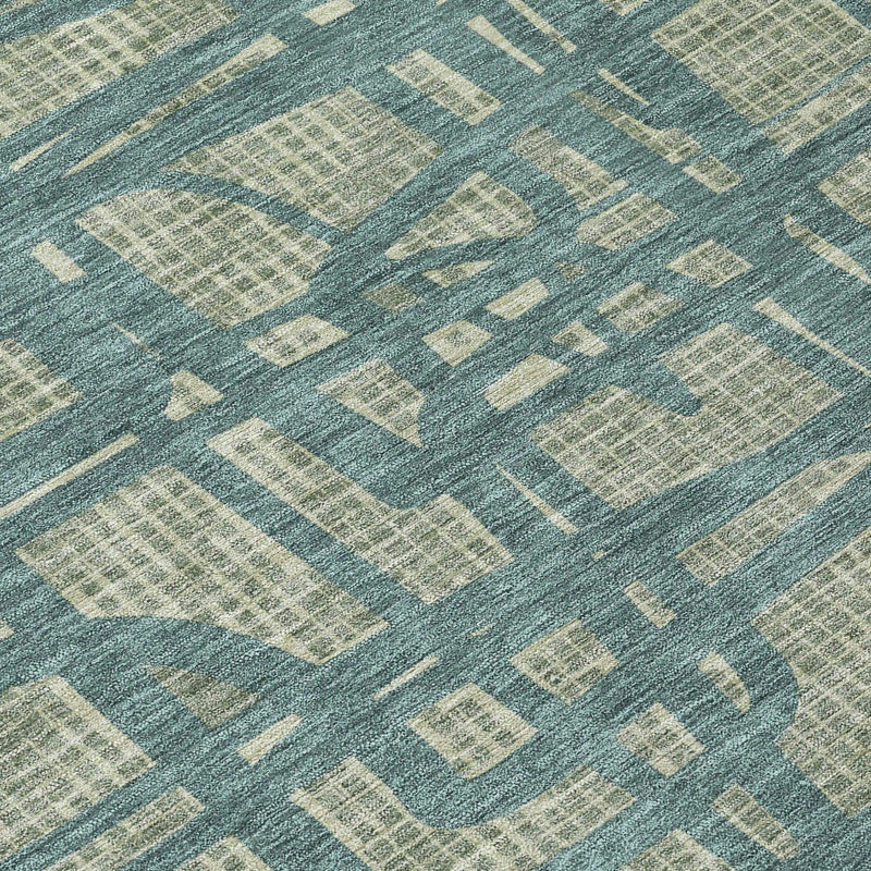 Blue and cream abstract patterned area rug, soft texture, modern design ideal for contemporary living spaces.
