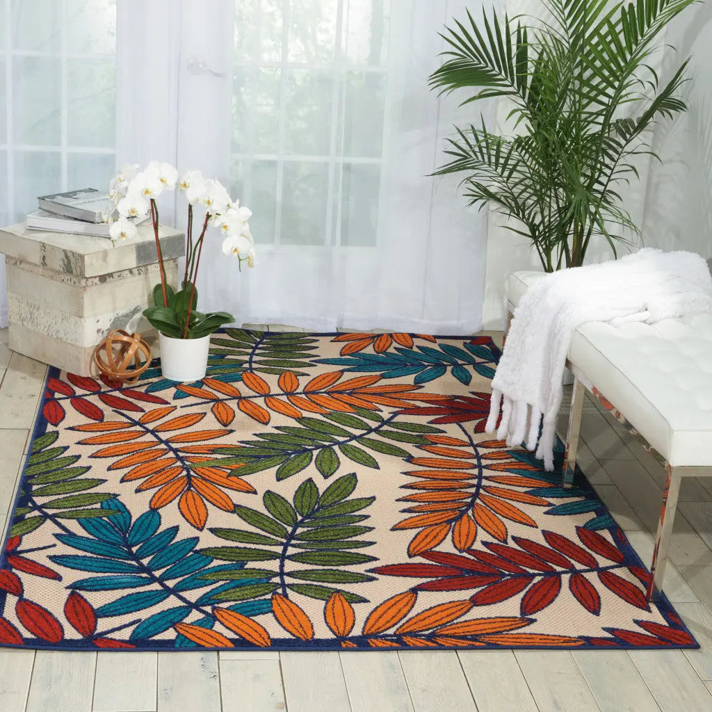 5' X 8' Ivory And Blue Floral Indoor Outdoor Area Rug - GreatEagleInc
