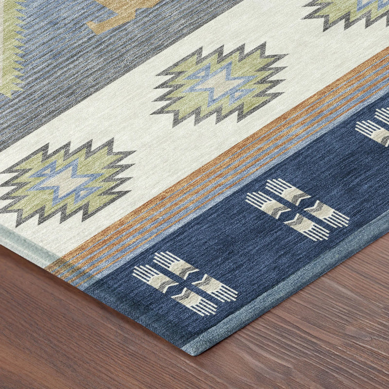 Navy and cream geometric pattern area rug with textured accents, perfect for modern or bohemian decor.