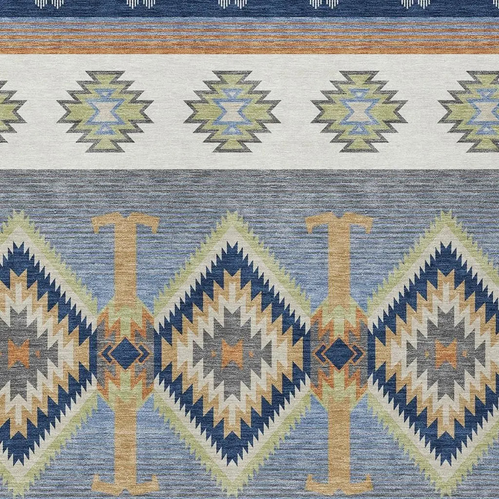 Multicolor geometric area rug in blue, green, and beige with tribal patterns, perfect for modern or bohemian decor.