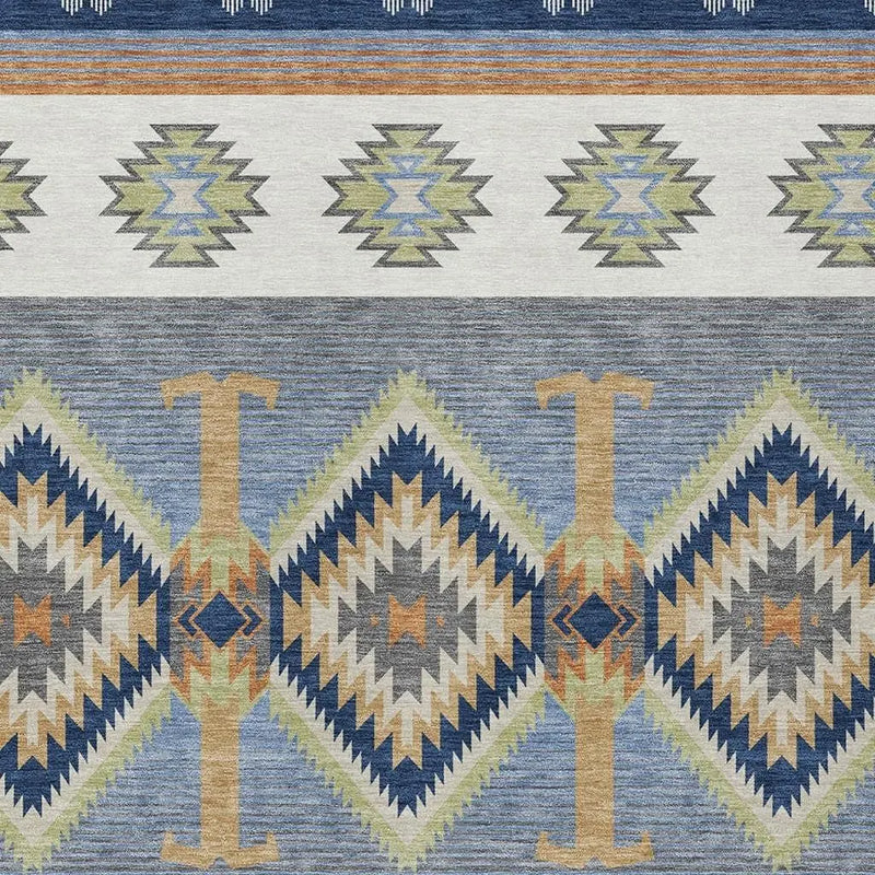 Multicolor geometric area rug in blue, green, and beige with tribal patterns, perfect for modern or bohemian decor.