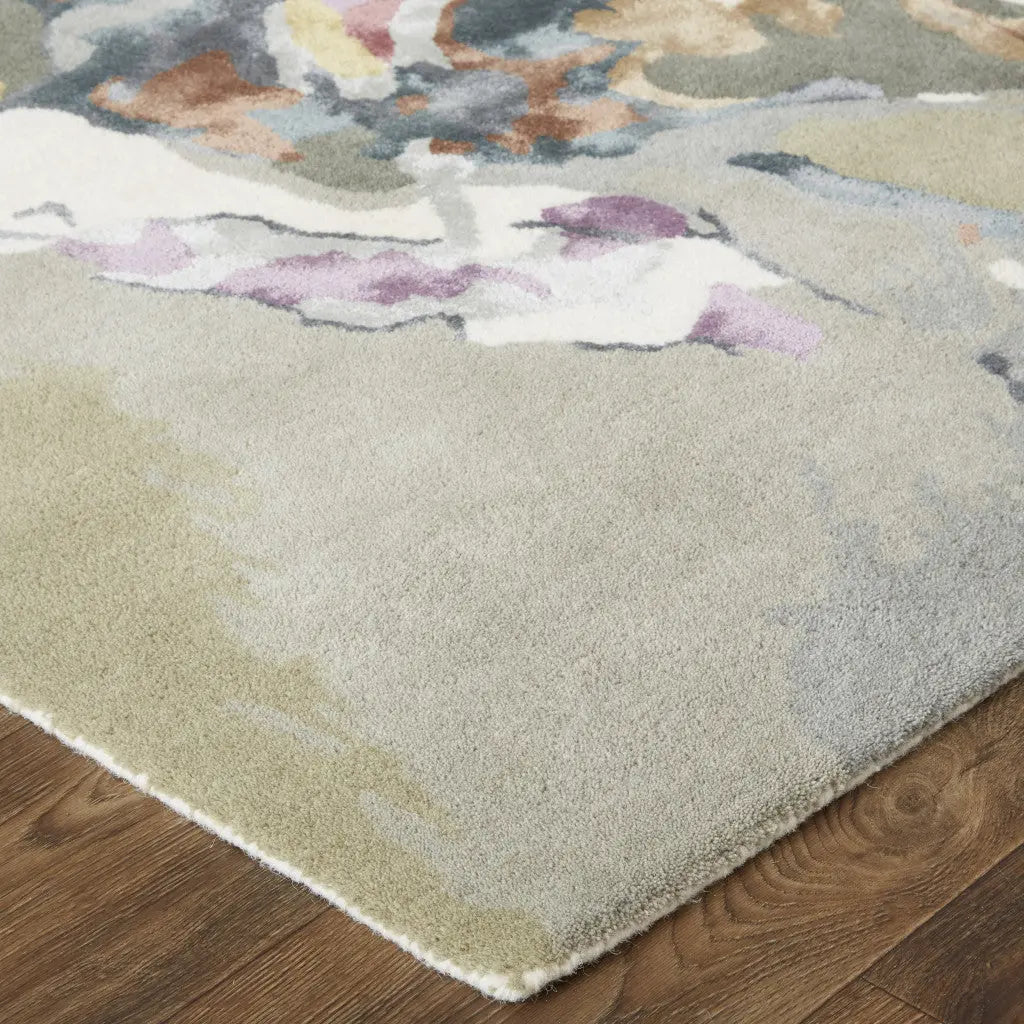 Abstract multicolor area rug in soft pastels, featuring a plush pile on a neutral background, perfect for modern decor.
