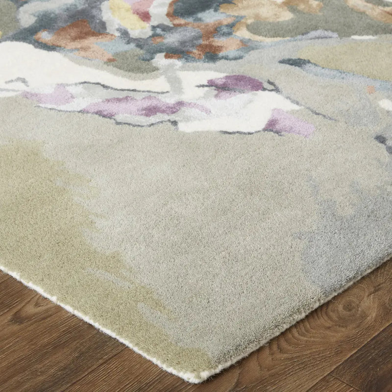 Abstract multicolor area rug in soft pastels, featuring a plush pile on a neutral background, perfect for modern decor.