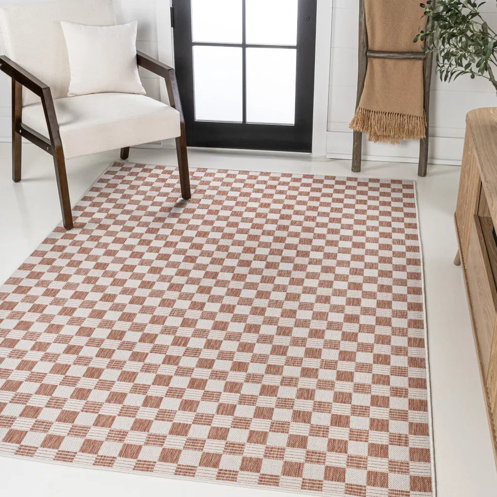 5' X 8' Salmon And Cream Geometric Indoor Outdoor Area Rug - GreatEagleInc