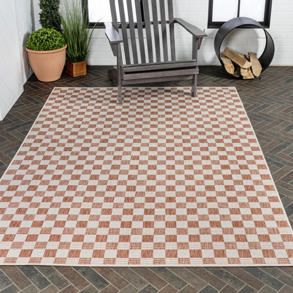 5' X 8' Salmon And Cream Geometric Indoor Outdoor Area Rug - GreatEagleInc