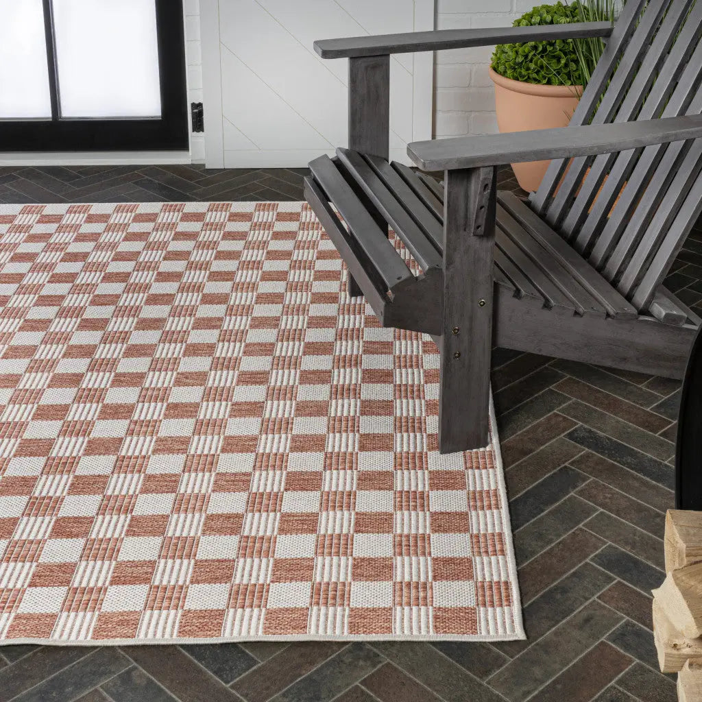5' X 8' Salmon And Cream Geometric Indoor Outdoor Area Rug - GreatEagleInc