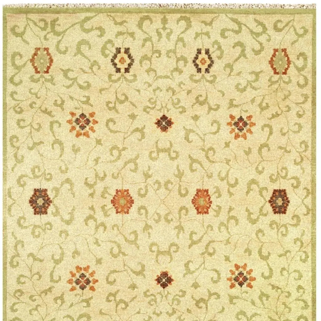 5' X 8' Tan Green And Orange Wool Floral Hand Knotted Area Rug With Fringe Homeroots Home Decor