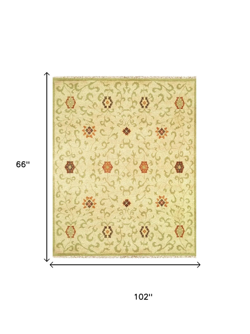 5' X 8' Tan Green And Orange Wool Floral Hand Knotted Area Rug With Fringe Homeroots Home Decor
