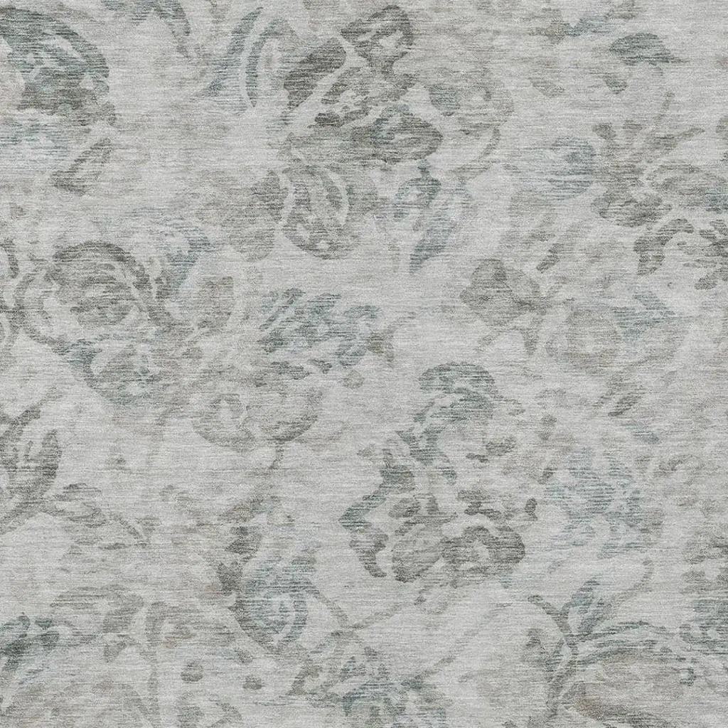 Elegant gray floral pattern area rug made of soft polyester, perfect for modern home decor.