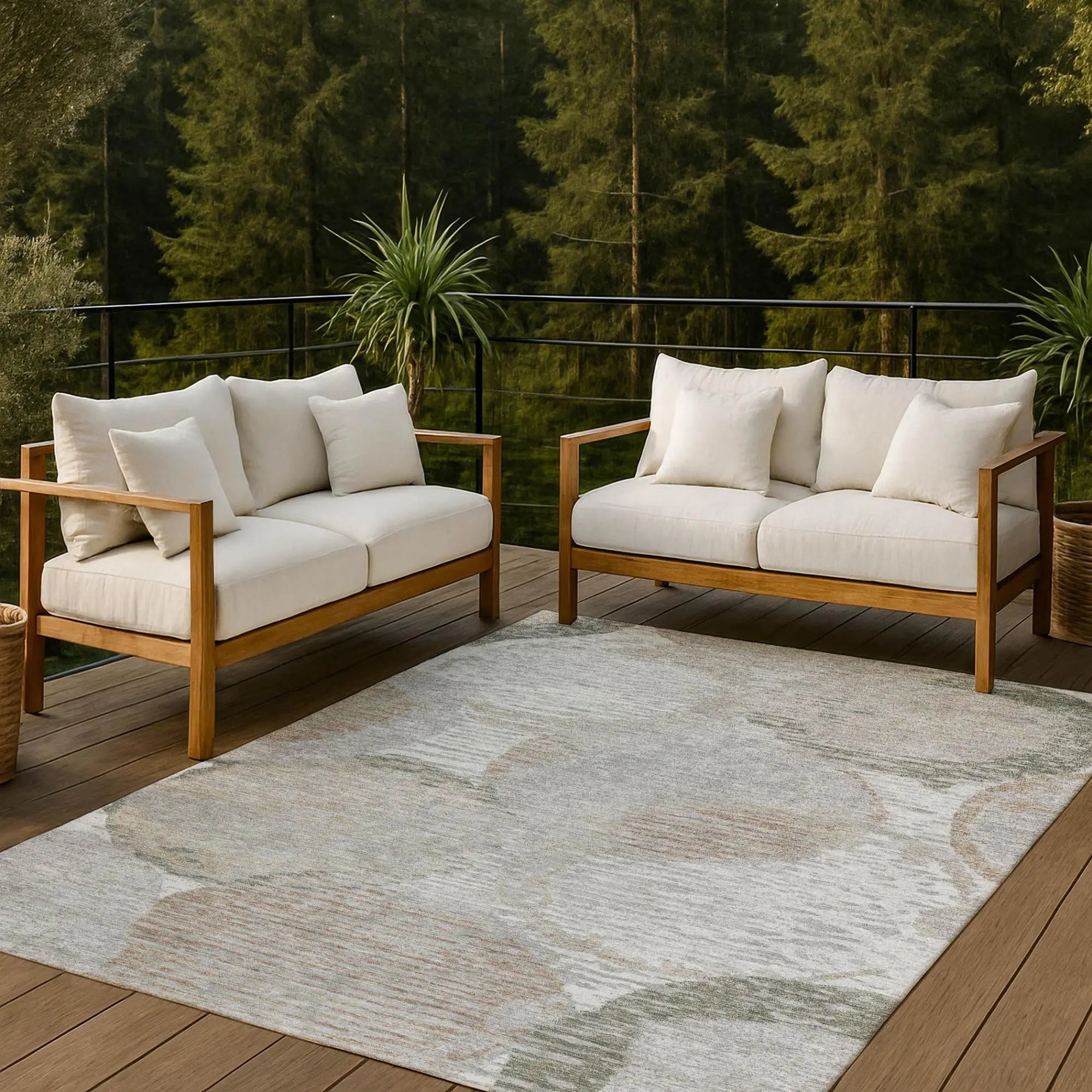 Beige upholstered outdoor sofa set with wooden frame, featuring two spacious seats and decorative pillows on a patterned rug.