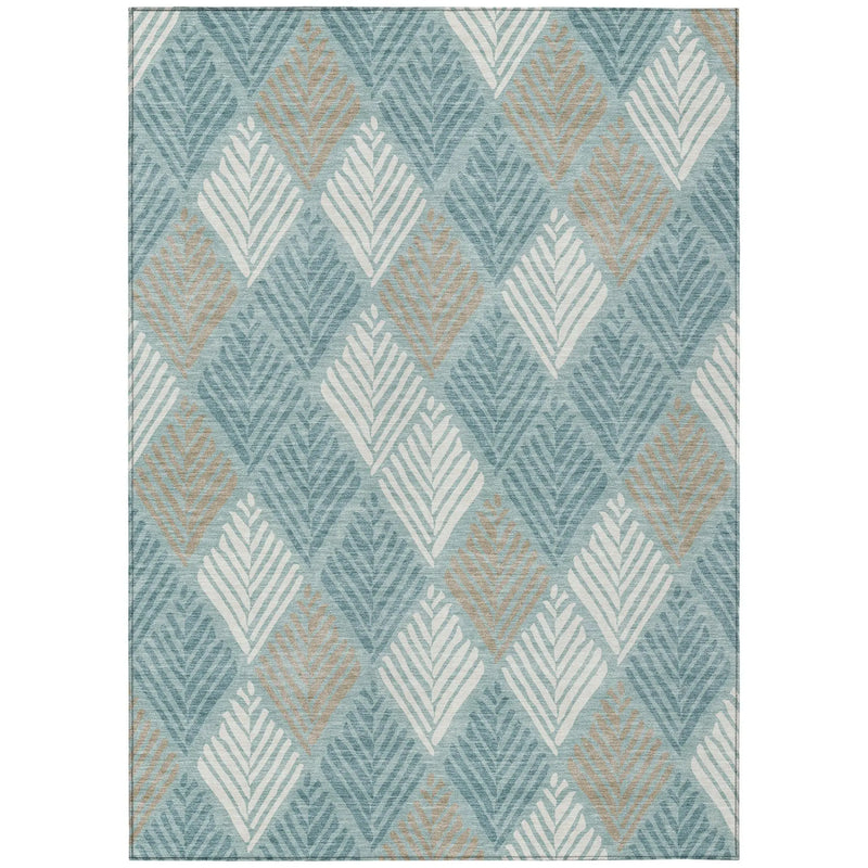 Geometric area rug in teal and beige, featuring a modern leaf pattern on soft, durable fabric. Perfect for stylish interiors.