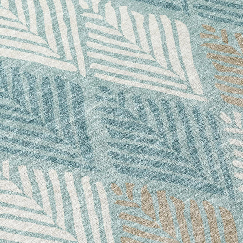 Blue and beige leaf-patterned area rug, made of soft, durable fabric, perfect for contemporary decor.