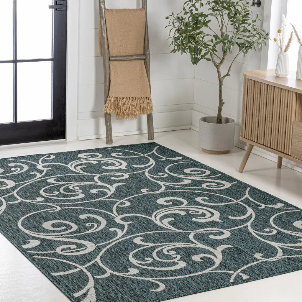 5' X 8' Turquoise And Cream Floral Indoor Outdoor Area Rug Homeroots Outdoor