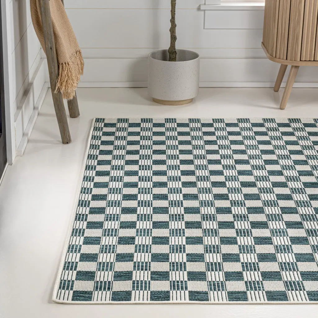5' X 8' Turquoise And Cream Geometric Indoor Outdoor Area Rug - GreatEagleInc