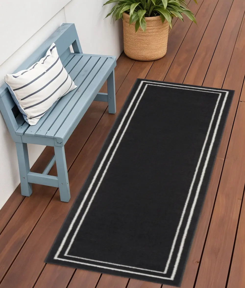6' Black And Ivory Indoor Outdoor Runner Rug Homeroots Outdoor