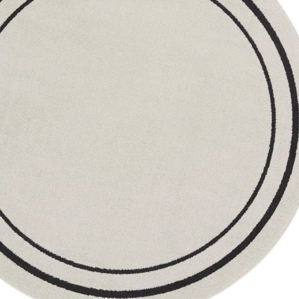6' Ivory And Black Round Indoor Outdoor Area Rug Homeroots Outdoor
