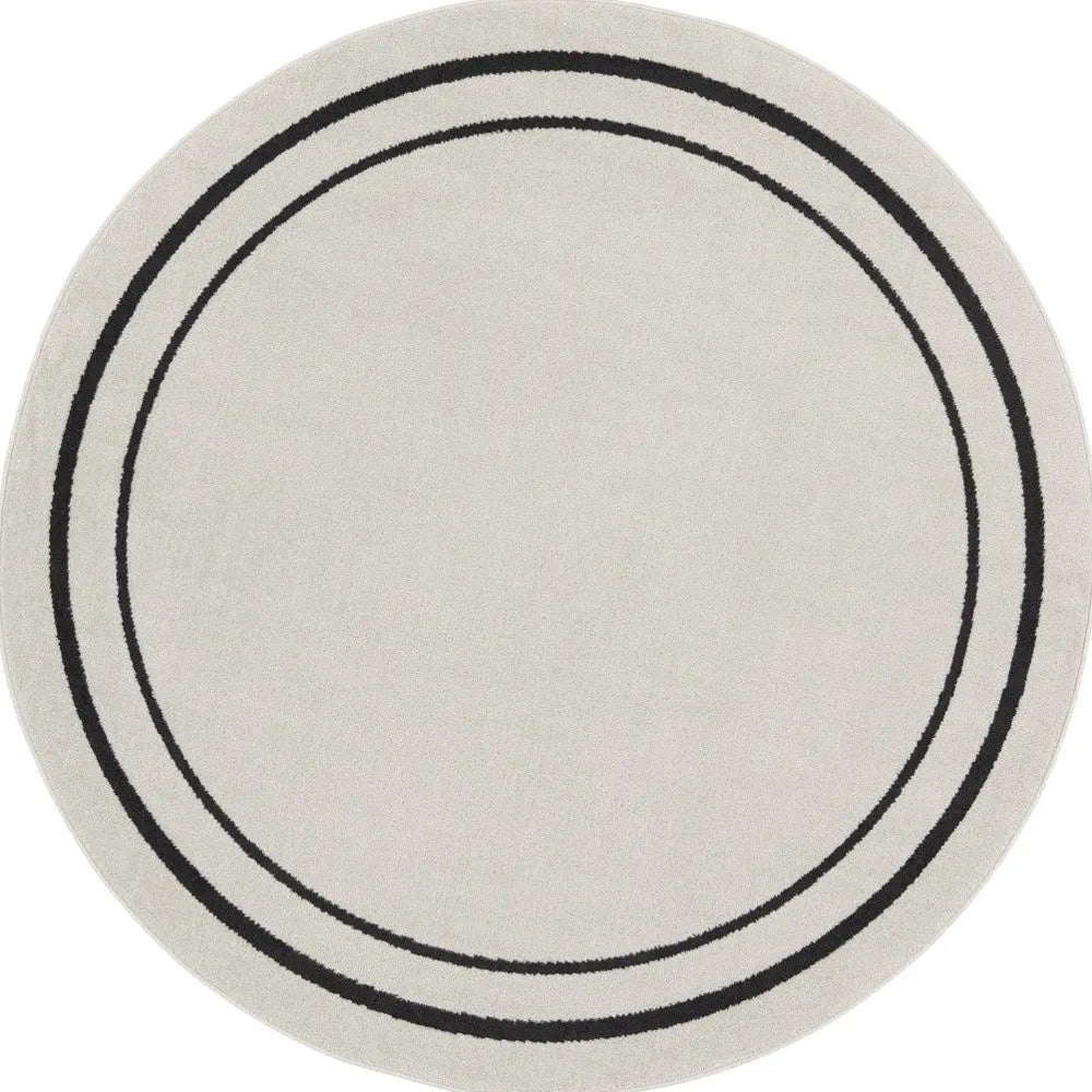 6' Ivory And Black Round Indoor Outdoor Area Rug Homeroots Outdoor