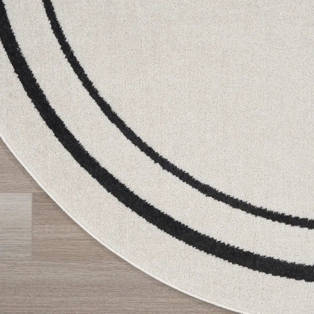 6' Ivory And Black Round Indoor Outdoor Area Rug Homeroots Outdoor
