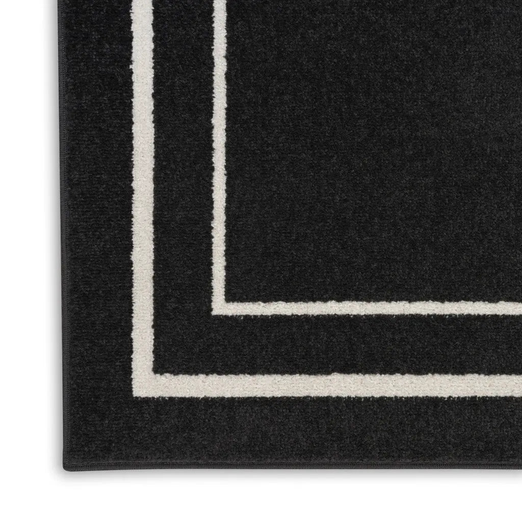 6' X 9' Black And Ivory Indoor Outdoor Area Rug Homeroots Outdoor
