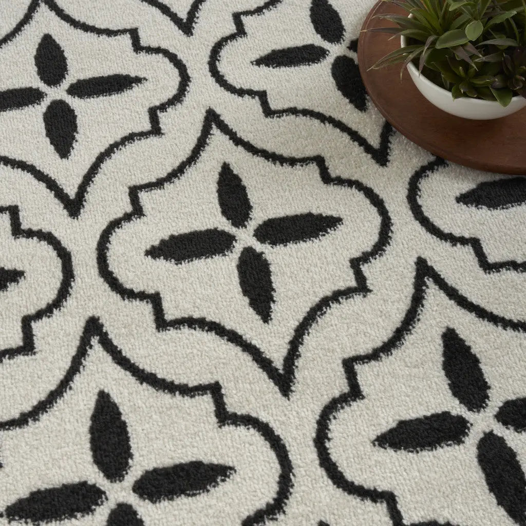 6' X 9' Ivory And Black Geometric Indoor Outdoor Area Rug Homeroots Outdoor