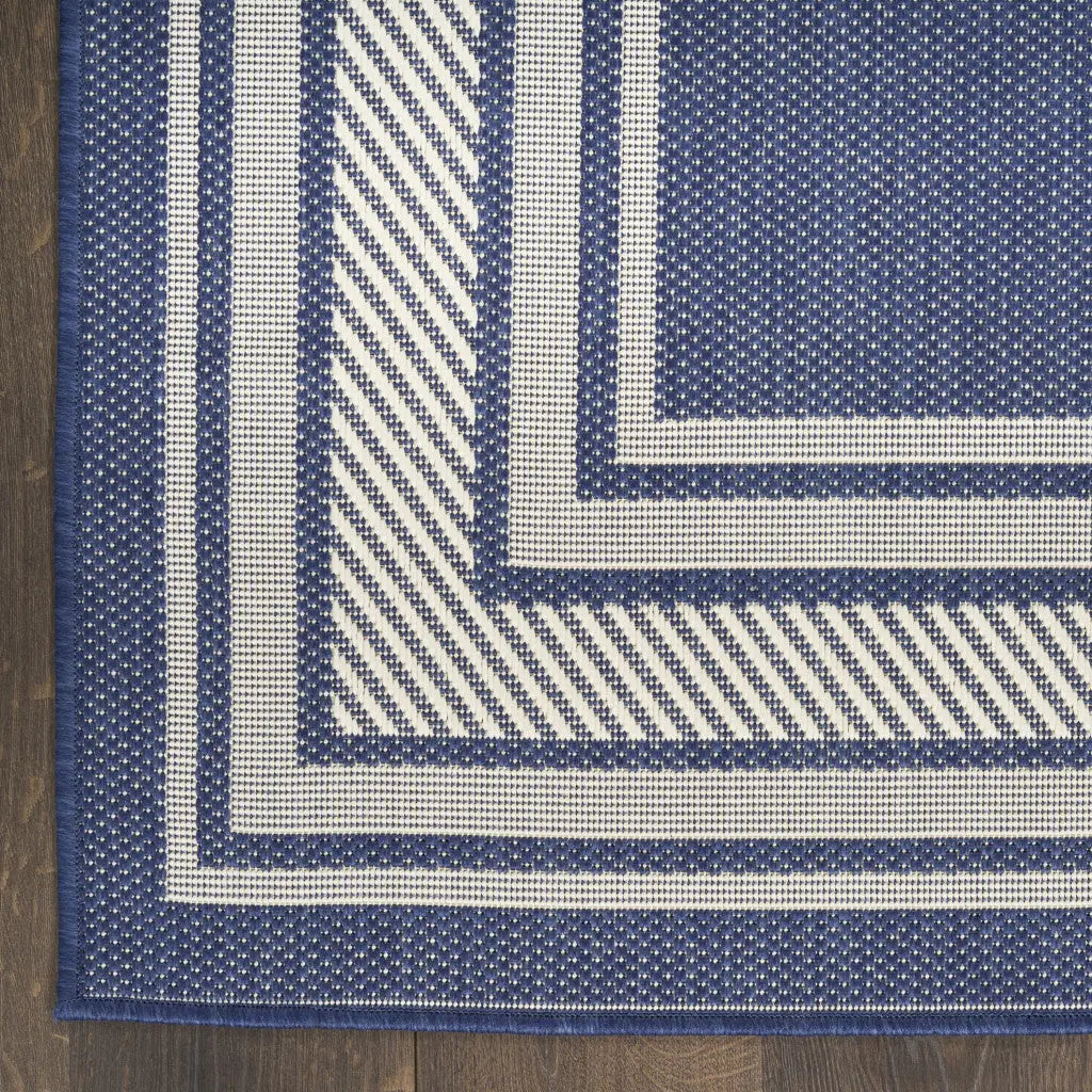 6' X 9' Navy Blue And Ivory Geometric Indoor Outdoor Area Rug Homeroots Outdoor
