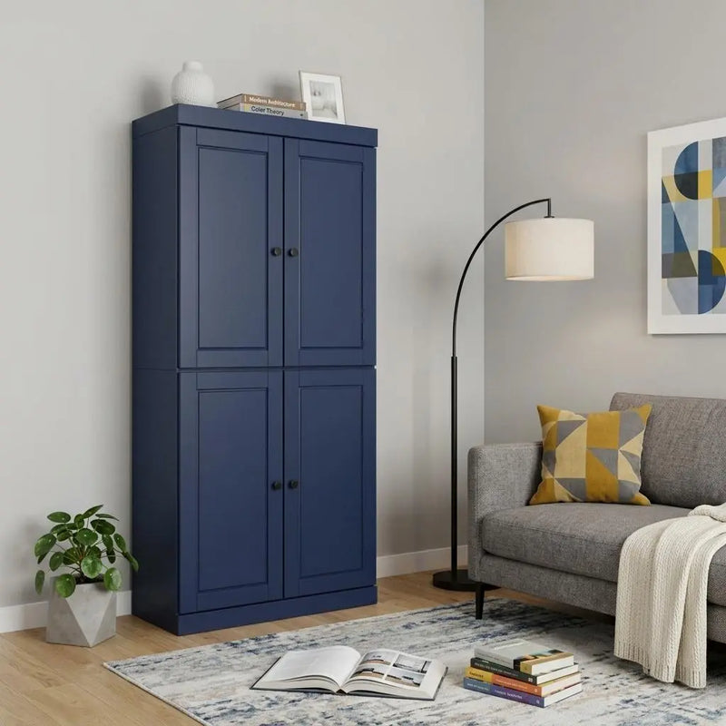 Navy blue wood cabinet with two doors, sleek design, modern style, ideal for living room storage, paired with a gray sofa.