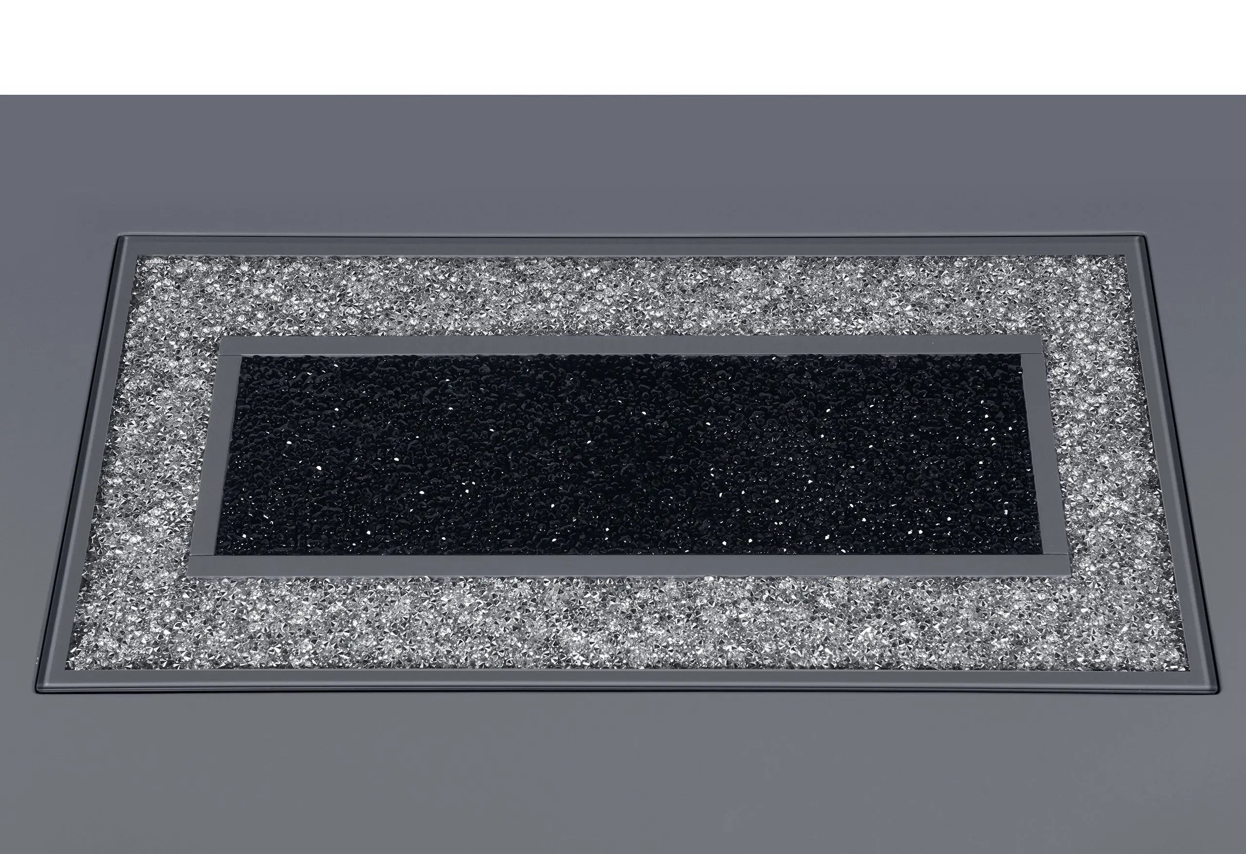 Elegant black and silver glitter mat with a textured surface, perfect for modern home decor.