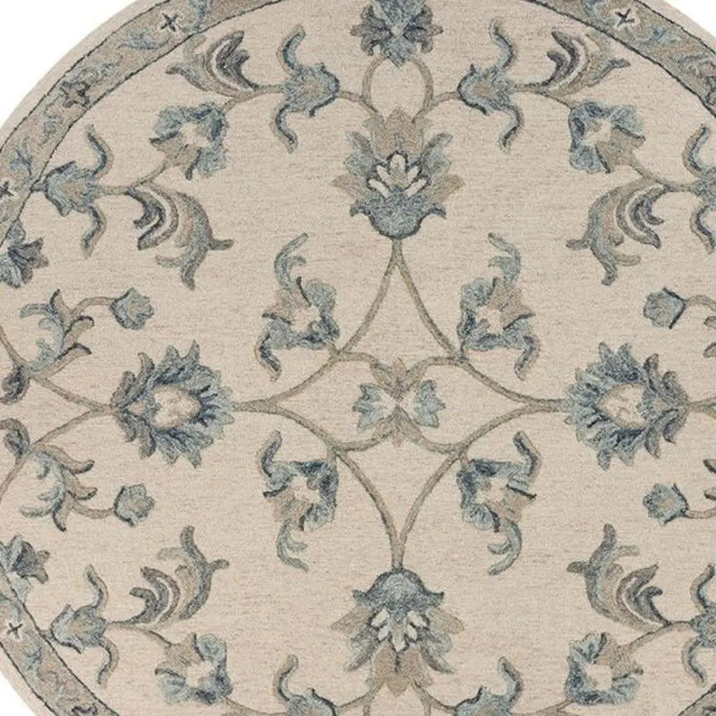 7' Ivory And Blue Wool Hand Tufted Round Rug Homeroots Home Decor