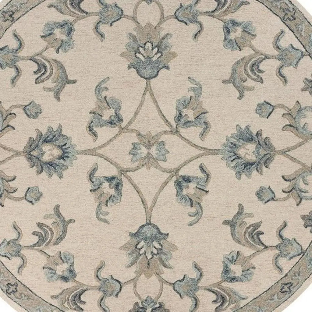 7' Ivory And Blue Wool Hand Tufted Round Rug Homeroots Home Decor