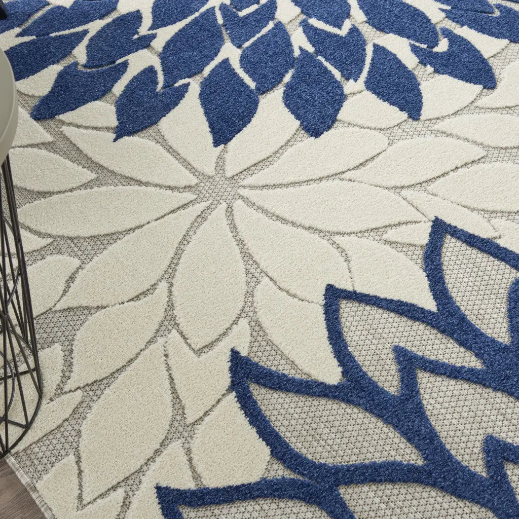 7' X 10' Ivory And Blue Indoor Outdoor Area Rug - GreatEagleInc