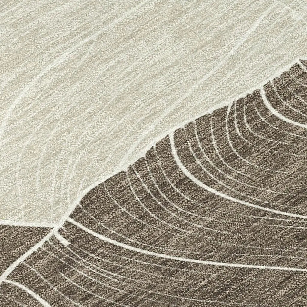Beige and brown abstract area rug with textured lines, perfect for modern home decor.