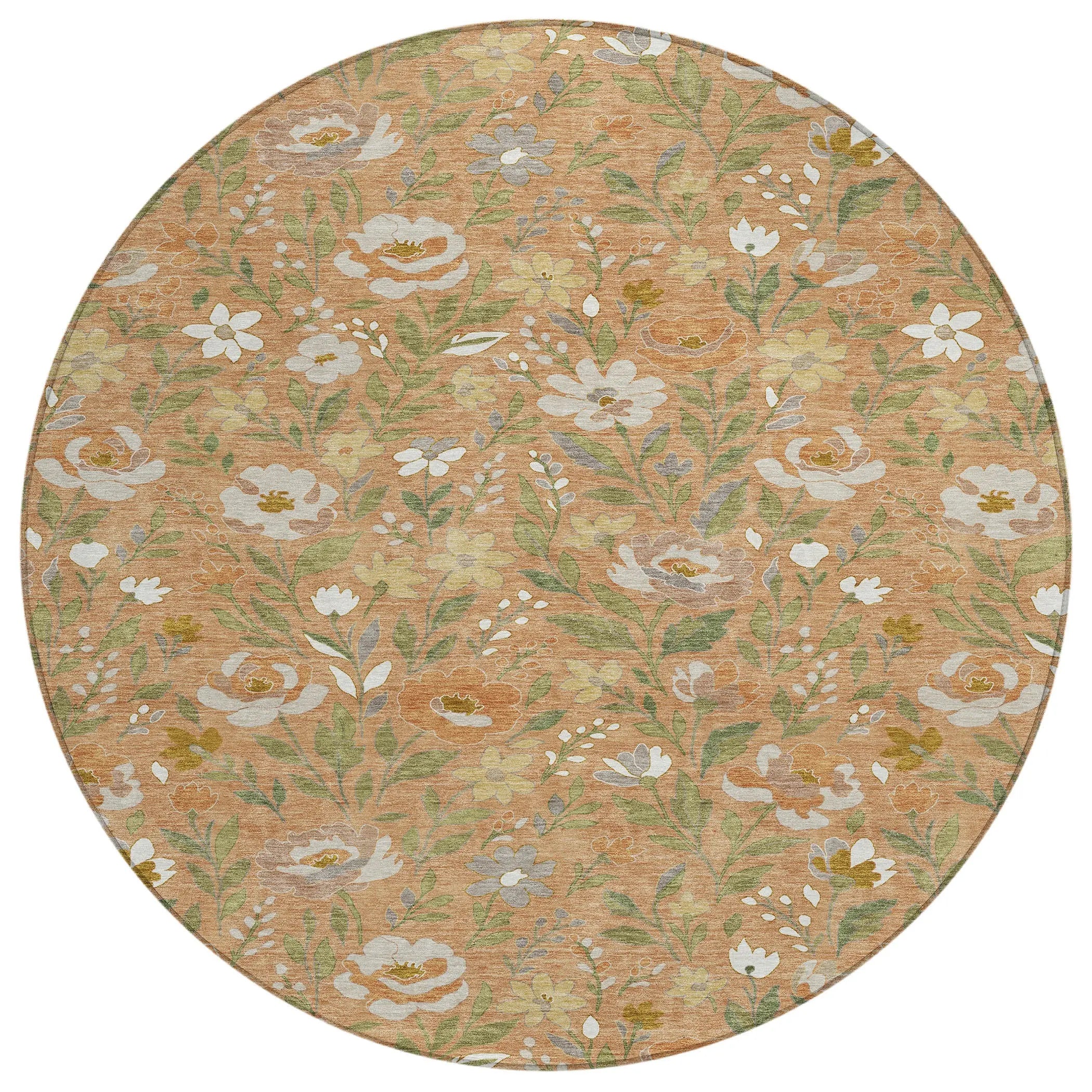 Round floral area rug in soft orange and green hues, featuring delicate flowers on a textured background.