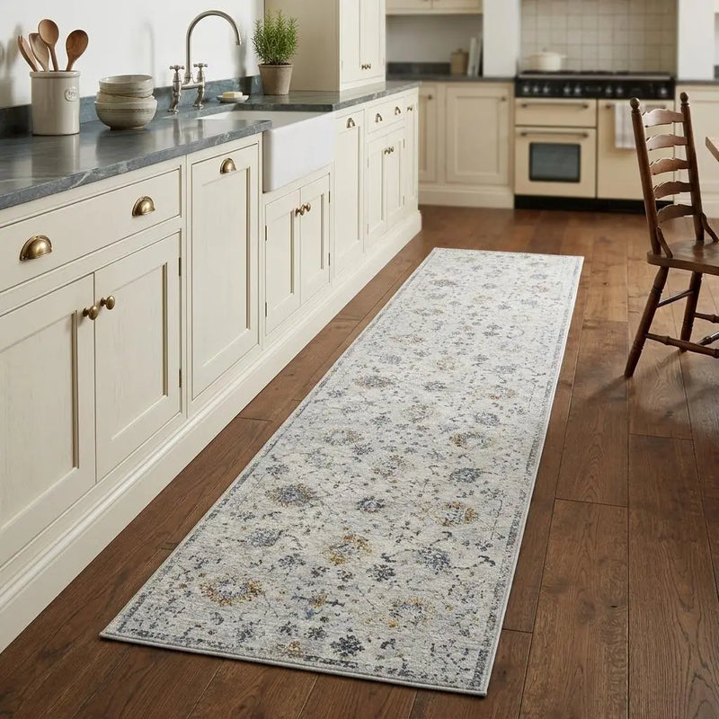 Elegant grey and cream floral runner rug in a vintage style, perfect for kitchens and hallways.