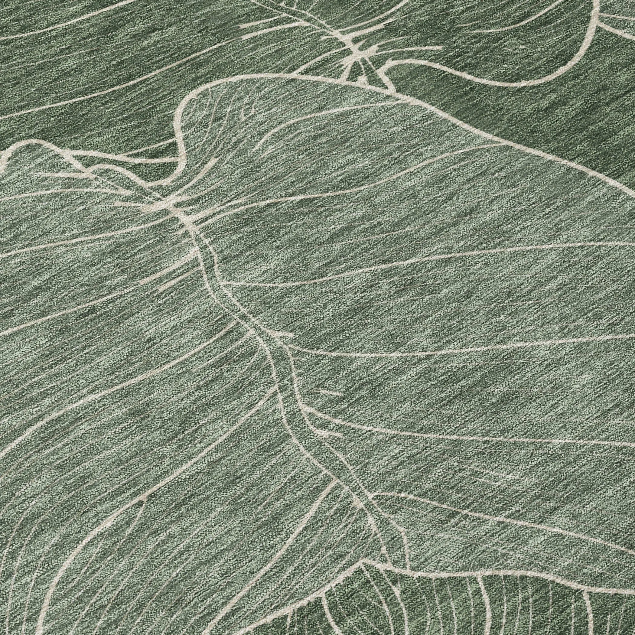 Green and white abstract leaf design area rug, soft texture, modern style, perfect for home decor.