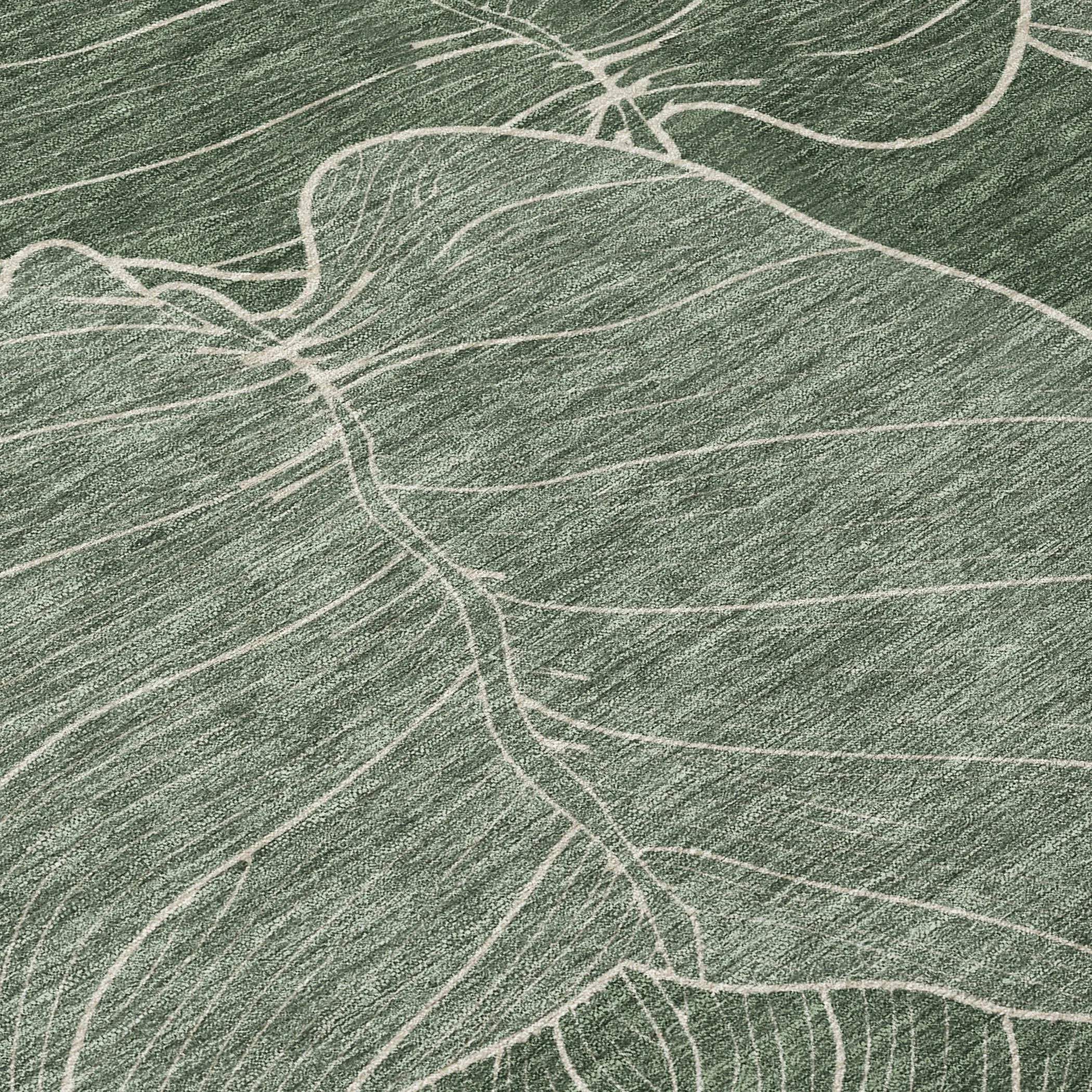 Green and white abstract leaf design area rug, soft texture, modern style, perfect for home decor.