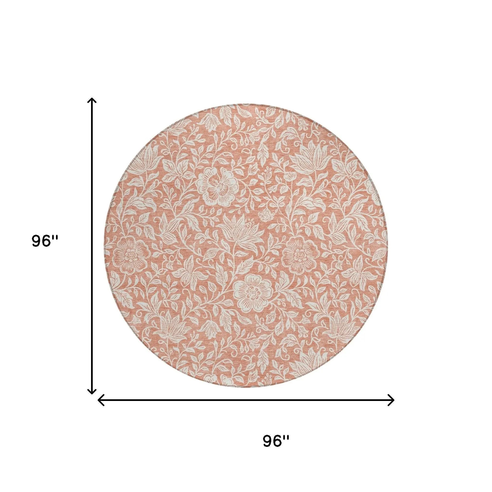 Round cotton tablecloth in soft peach with intricate white floral pattern, 96 inches in diameter. Ideal for elegant dining.