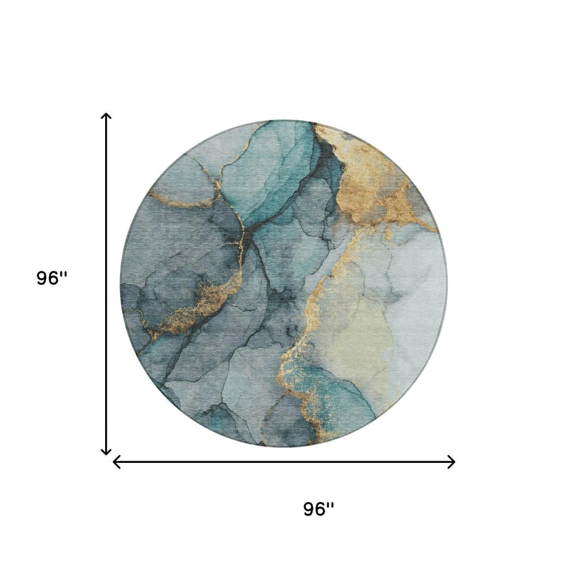 Round area rug, 96" diameter, featuring teal, gray, and gold abstract design in soft, textured fabric.