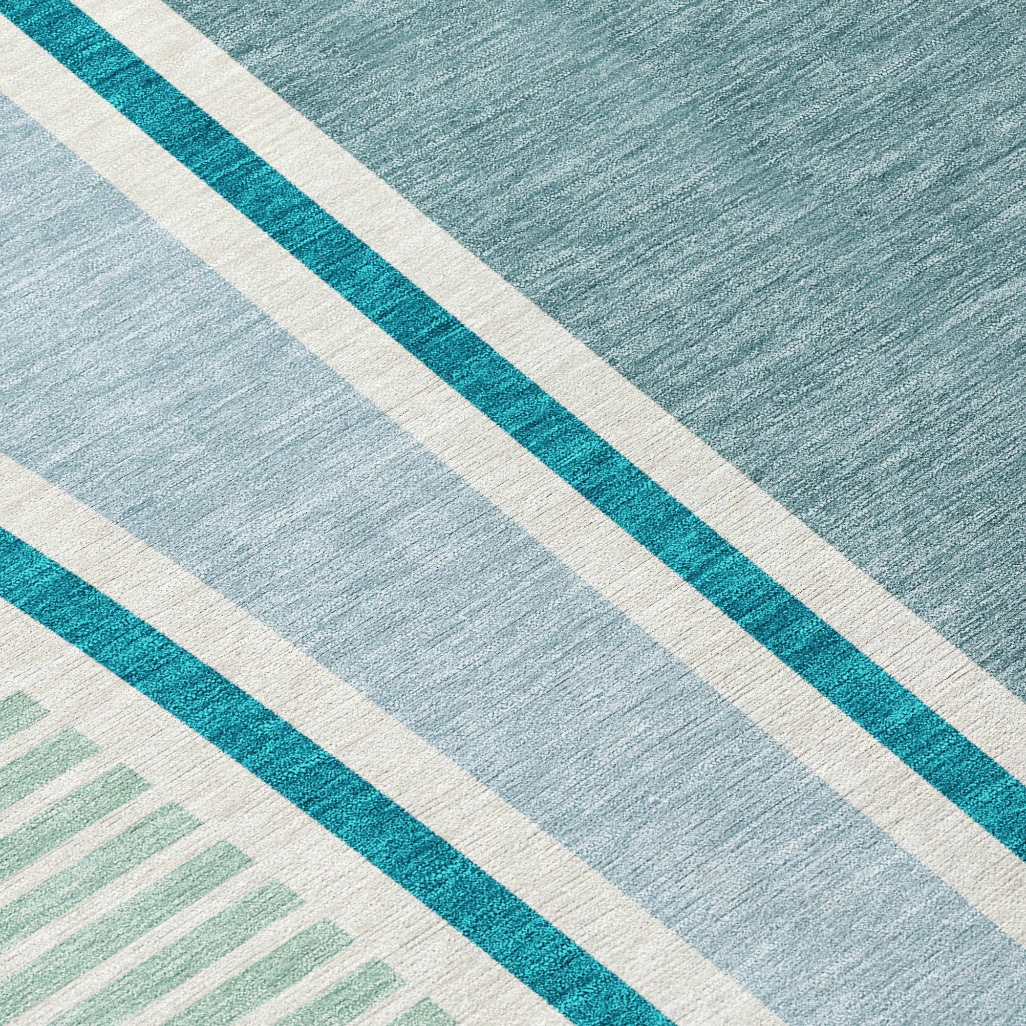 Blue and teal striped area rug with a soft texture, perfect for modern home decor.