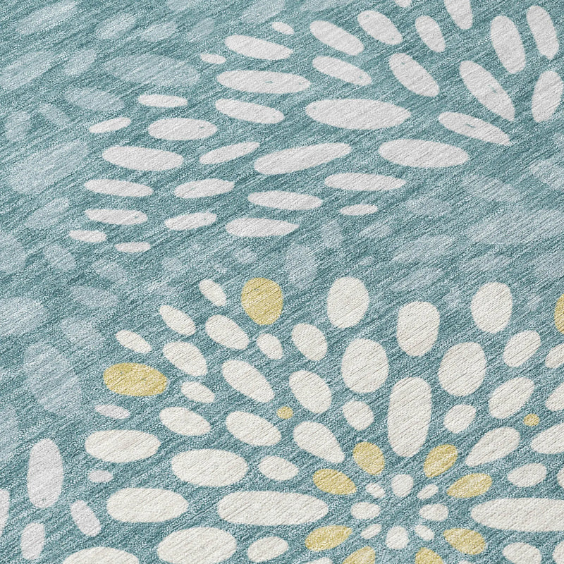 Blue and white floral patterned area rug with yellow accents, made of soft, durable synthetic material.