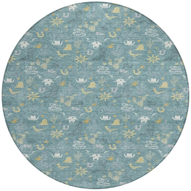 Round ocean-themed area rug in teal, featuring white and gold nautical motifs like anchors and shells. Ideal for coastal decor.