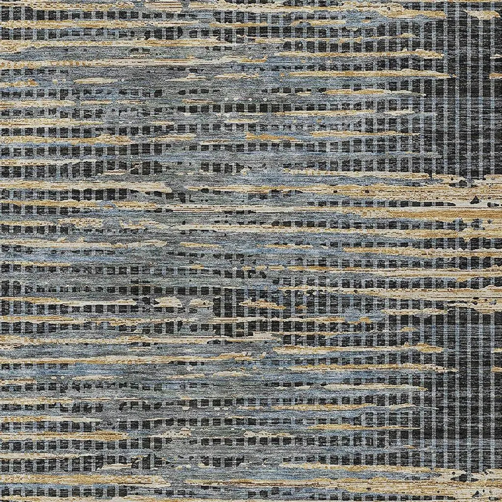 Multicolored abstract rug in blue, gray, and tan, featuring a textured pattern for modern home decor.