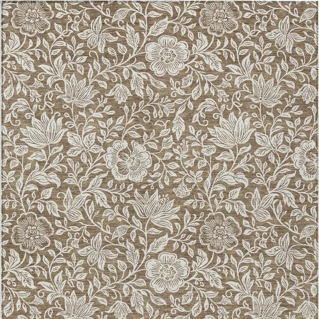 Brown floral fabric with white intricate patterns, perfect for upholstery and home decor projects.