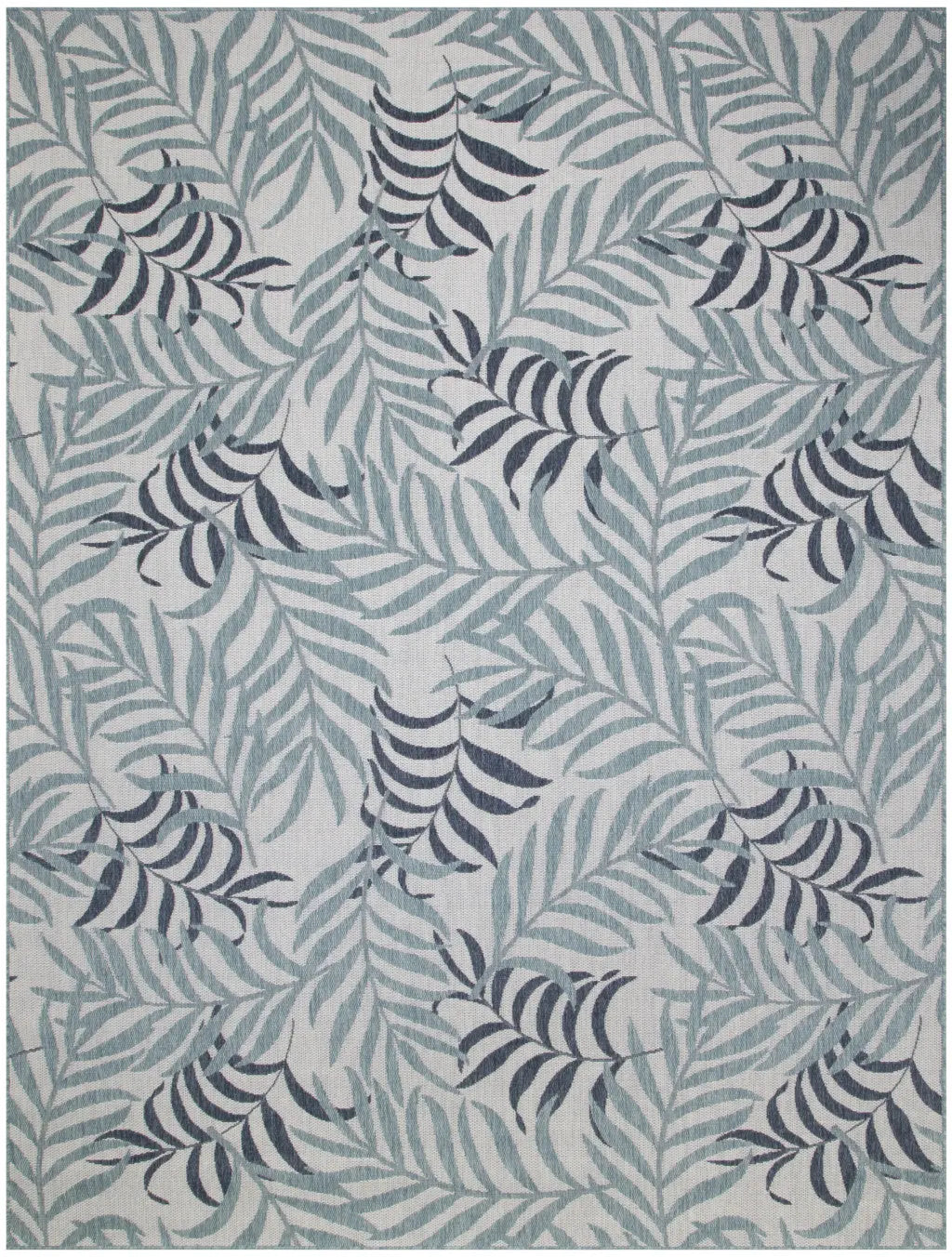 Blue and gray leafy patterned area rug, featuring a modern botanical design on a light background.