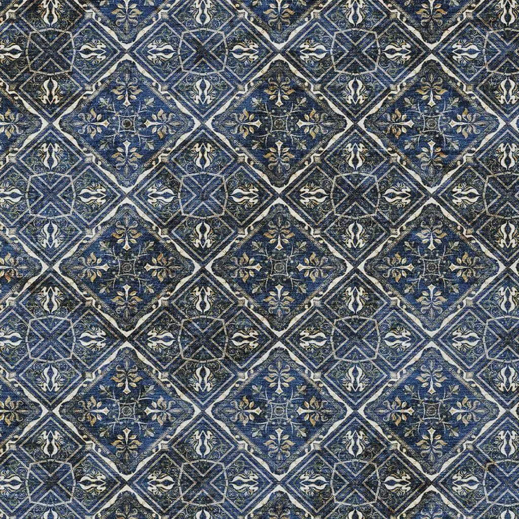 Navy blue patterned tile with intricate floral designs in gold and cream, perfect for vintage-inspired decor.